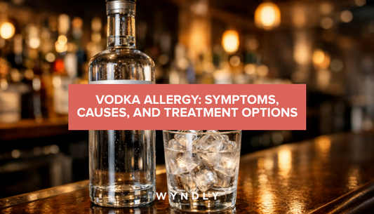 A photorealistic photograph of a clear vodka bottle and glass with ice on a bar counter, with soft ambient lighting.