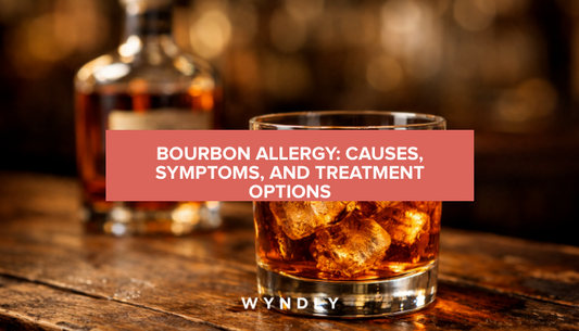 A beautiful, photorealistic photograph of a glass of bourbon whiskey with ice on a rustic wooden bar counter, with a bourbon bottle slightly blurred in the background.